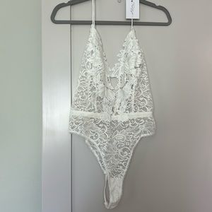 White lace bodysuit by In Bloom. Never worn. New with tags attached.
